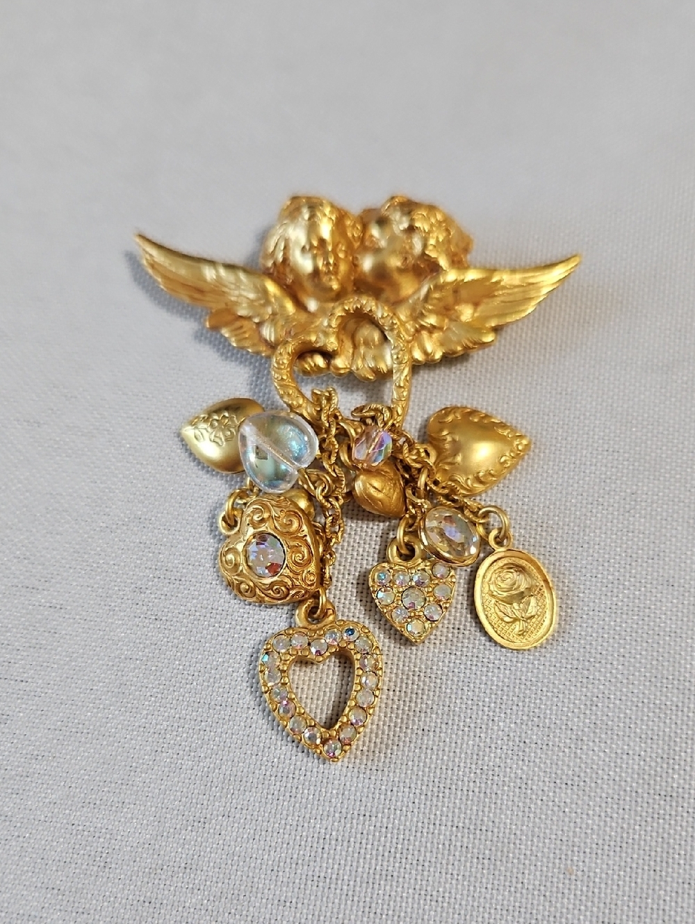 Kirks Folly Gold Tone Cherub Heart Charm Brooch - Gold